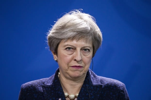 Theresa May blue background