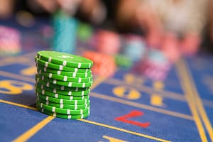 Poland and UK strengthen oversight of online gambling operations Roulette table with chips on it (selective focus)