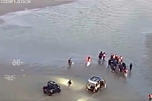 French police stopping boat X