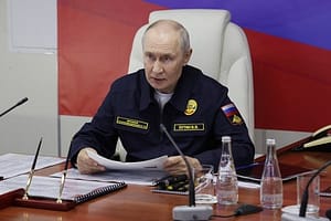 Vladimir Putin, in military uniform, visits the final phase of exercises of the Russian Pacific Fleet on August 12, 2026.