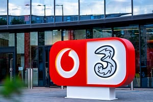 VodafoneThree targets £1bn annual savings as merger reshapes UK mobile market VodafoneThree