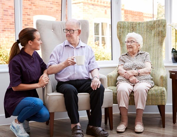 Residential support worker is spending time with her client