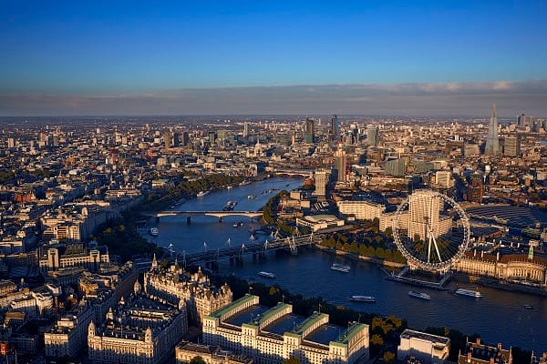 London skyline with Google, Facebook and other logos superimposed onto the skyline