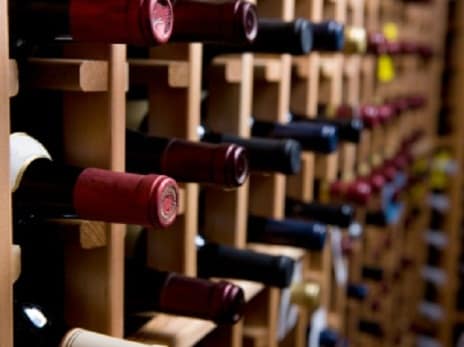 Some bottles of wine in a cellar - Burgundy is the new Claret - WineChap