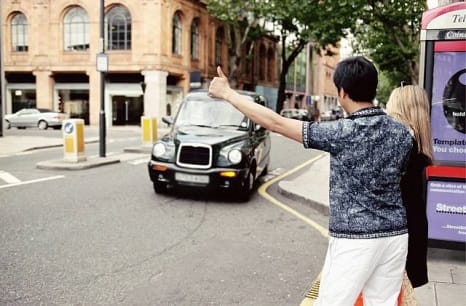 Person hailing cab