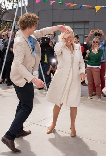 Spinning around:The Duchess takes to the dance floor accepting an invitation from university student Sam Johnson