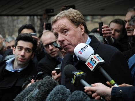 Tottenham Hotspur manager Harry Redknapp leaves Southwark Crown Court in London after being cleared of taking bungs in an offshore tax dodge.