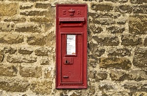 Wall Mounted Post Box showing the cipher ER for the reign of Queen Elizabeth II Burford PUBLICATION