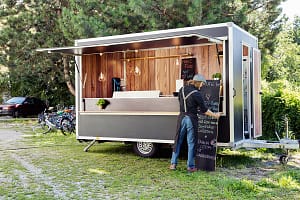 Man opening food truck for business