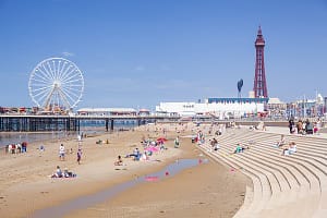 Blackpool Tower Blackpool Beach Blackpool Central Pier with holidaymakers and tourists Blackpool