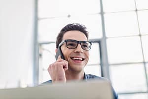 Man making phonecall using mobile phone