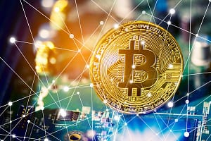 Bitcoin on electronic circuit board. Cryptography and Electronic money concept. Currency trading and Gold mining theme.