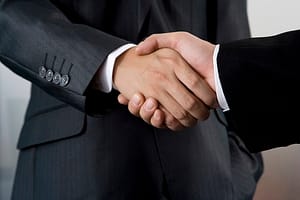 Close-up of businessmen shaking hands