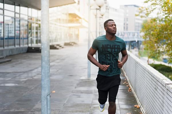 Young man running outdoors