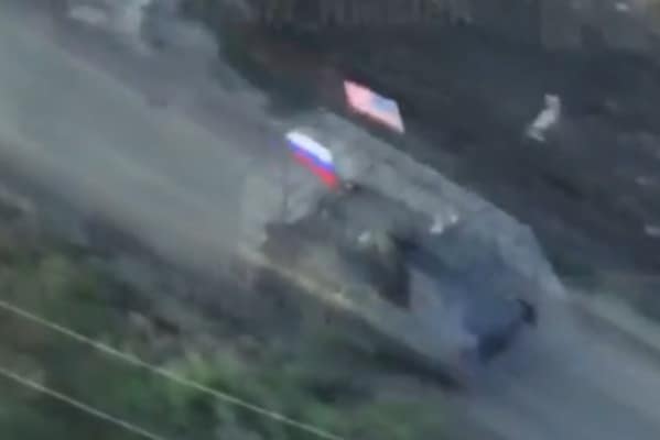 Russian fascists hail Trump as ally, deck military vehicles with US flags