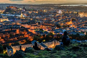 Edinburgh at night, Castle, ilumination of the city, view from Salisbury Crags,