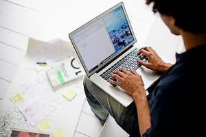 Graphic designer using laptop