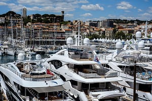 Rows of luxury super yachts contrast with Cannes Castle on Tuesday 14 May 2019
