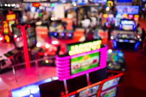 Blurry slots machines at a casino Blurry image of slots machines and other gambling equipment at a casino. Out of focus