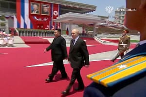 Russian President Vladimir Putin attends a welcoming ceremony on Wednesday June 19, 2024 with North Korean leader Kim Jong-un at Kim Il Sung Square in Pyongyang. The Kremlin released footage showing hundreds of thousands of people lining the streets and w