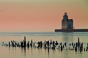 The Kewaunee Pierhead Lighthouse With Broken Supports of Rotten Pier, Kewaunee, Wisconsin, USA