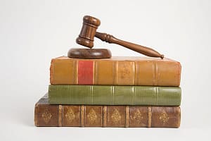 A gavel on top of books