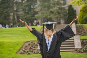 Graduating student rejoicing at campus
