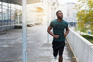 Young man running outdoors