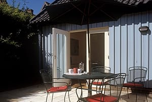 Patio area with a garden table and chairs.