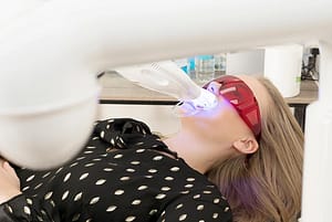 Young woman in dentist chair