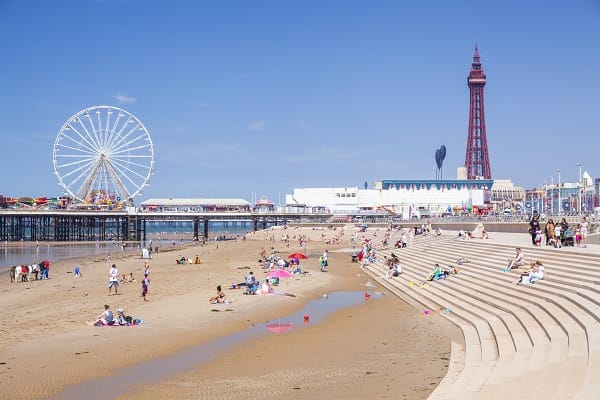 Blackpool Tower Blackpool Beach Blackpool Central Pier with holidaymakers and tourists Blackpool
