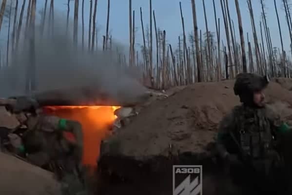 Footage shows the elite Azov Brigade storm Russian trenches in an ...