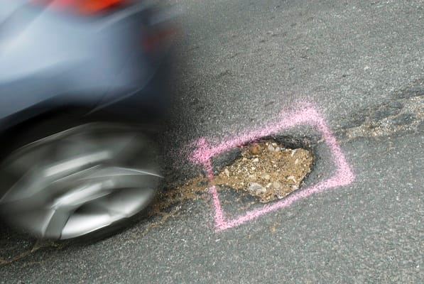Despite drivers paying their road tax councils are failing as pothole pitfalls costs motorists £1.7 billion last year Despite drivers paying their road tax councils are failing as pothole pitfalls costs motorists £1.7 billion last year